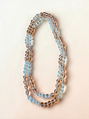 Monet 36” necklace featuring alternating clear, champagne crystal beads w silver